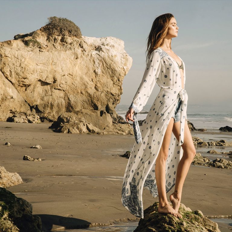 womain in beach white dress
