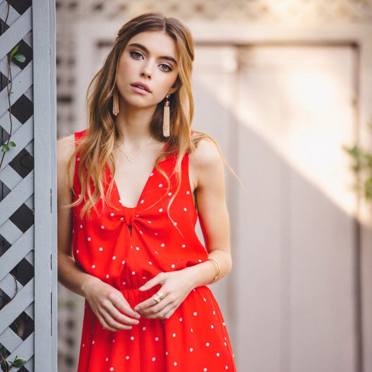 woman in red dress with white pattern